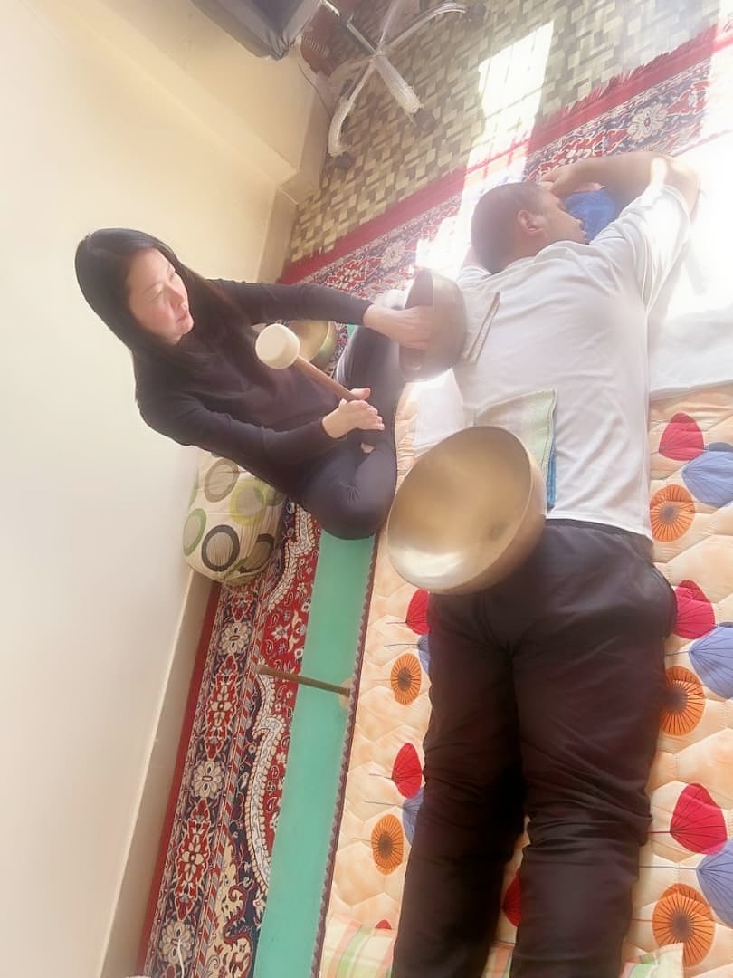 Private singing bowl therapy session