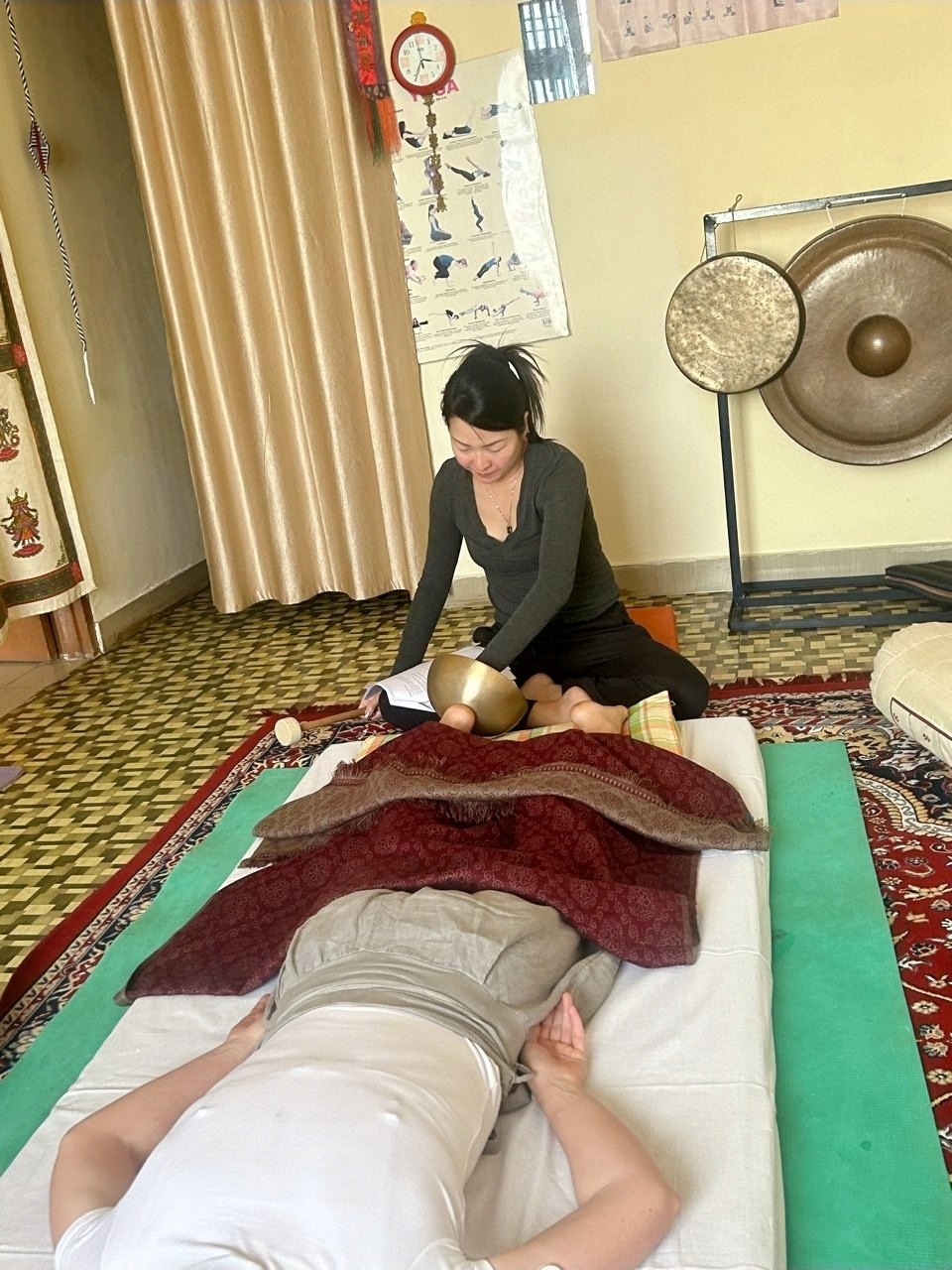 Camilla preparing a private sound healing session